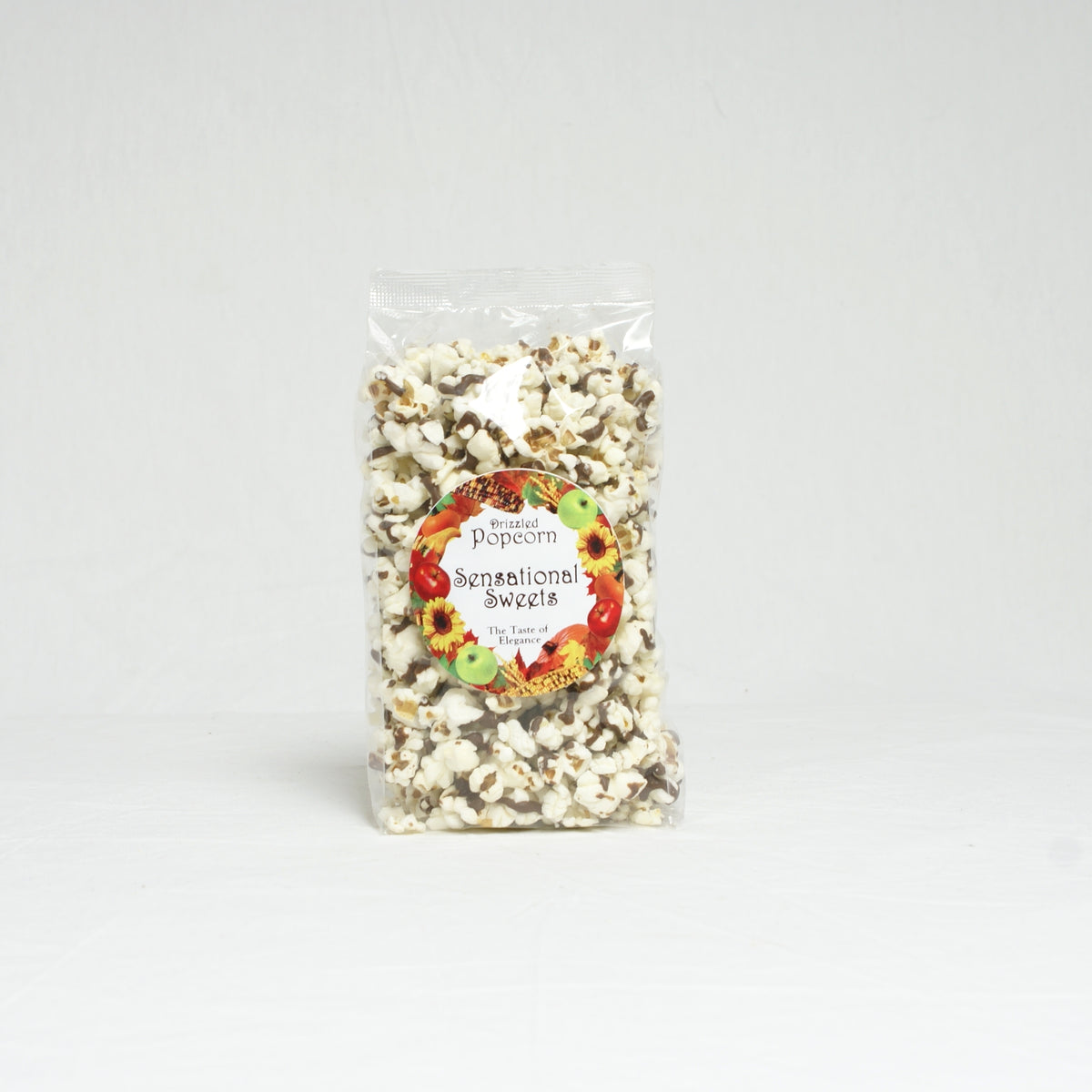 Bag of popcorn with a label on a white background